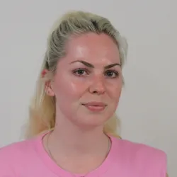 Blonde woman in pink t shirt