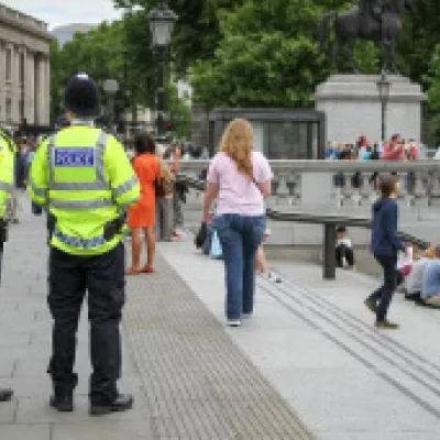 Two police officers stood in Trafalgar Square