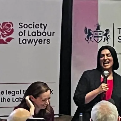 Photograph of the Lord Chancellor presenting at a Labour Party Conference event