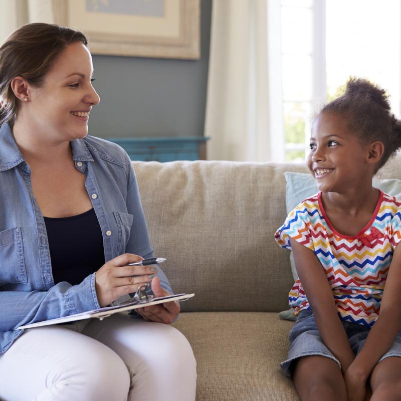 Professional talks to child